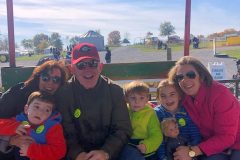 Family-with-grandparents-on-hayride